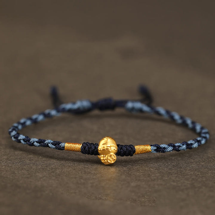 Pulsera de la suerte hecha a mano con monedas de cobre y el símbolo Fu del año de la serpiente en oro 999 con Buddha Stones