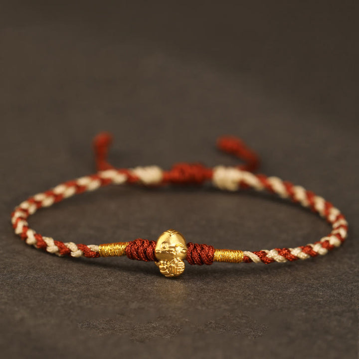 Pulsera de la suerte hecha a mano con monedas de cobre y el símbolo Fu del año de la serpiente en oro 999 con Buddha Stones