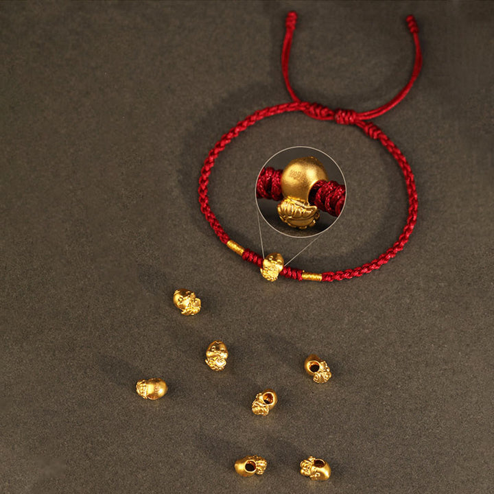 Pulsera de la suerte hecha a mano con monedas de cobre y el símbolo Fu del año de la serpiente en oro 999 con Buddha Stones