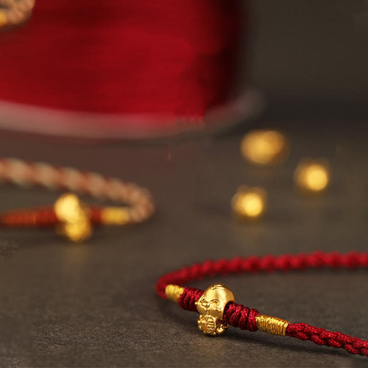 Pulsera de la suerte hecha a mano con monedas de cobre y el símbolo Fu del año de la serpiente en oro 999 con Buddha Stones