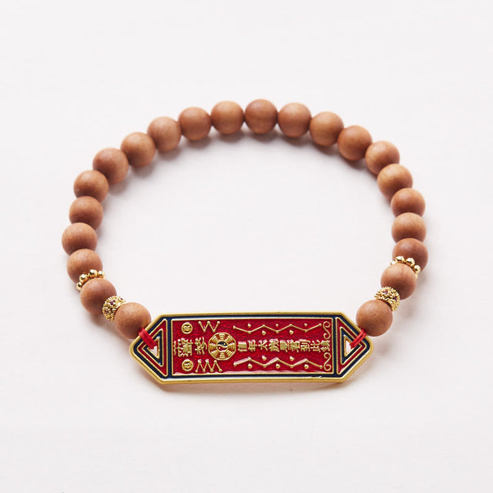 Pulsera de armonía con caracteres chinos Bagua Yin Yang de cobre bañado en oro con cuentas de madera de sándalo y Buddha Stones