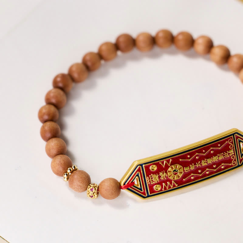 Pulsera de armonía con caracteres chinos Bagua Yin Yang de cobre bañado en oro con cuentas de madera de sándalo y Buddha Stones