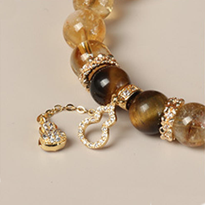 Pulsera de fuerza con calabaza de la suerte y cuentas de citrino y ojo de tigre natural de Buddha Stones