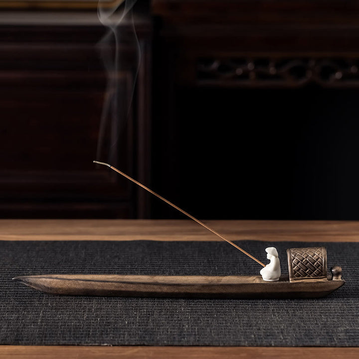 Quemador de incienso de cerámica marrón con forma de pescador y curación zen con Buddha Stones
