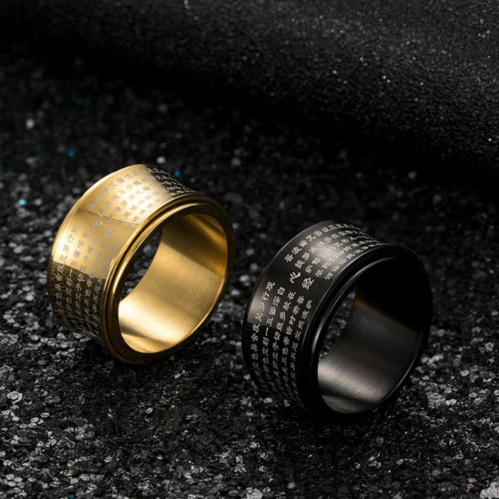 Anillo de equilibrio giratorio de acero y titanio con escrituras tibetanas en miniatura y Buddha Stones