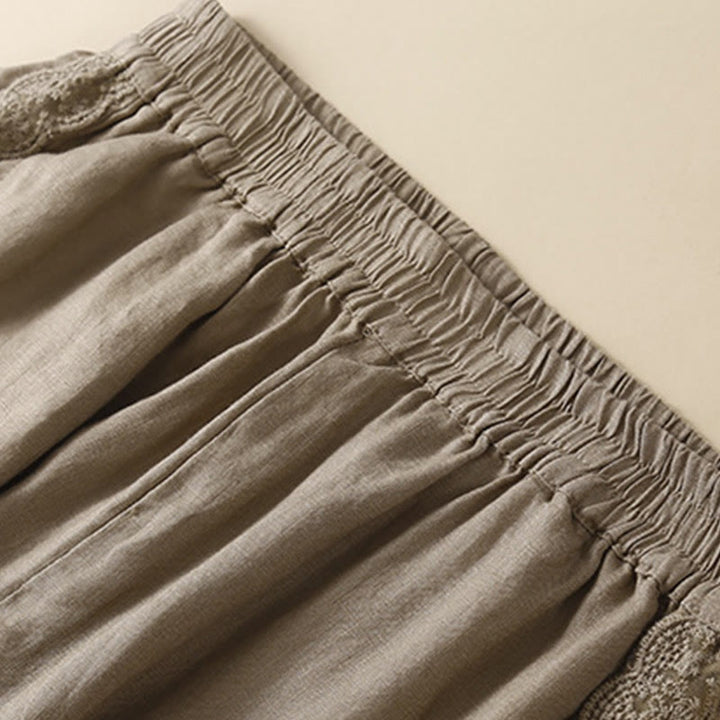 Pantalones de lino con bordado de flores en los laterales y bolsillos para mujer con Buddha Stones