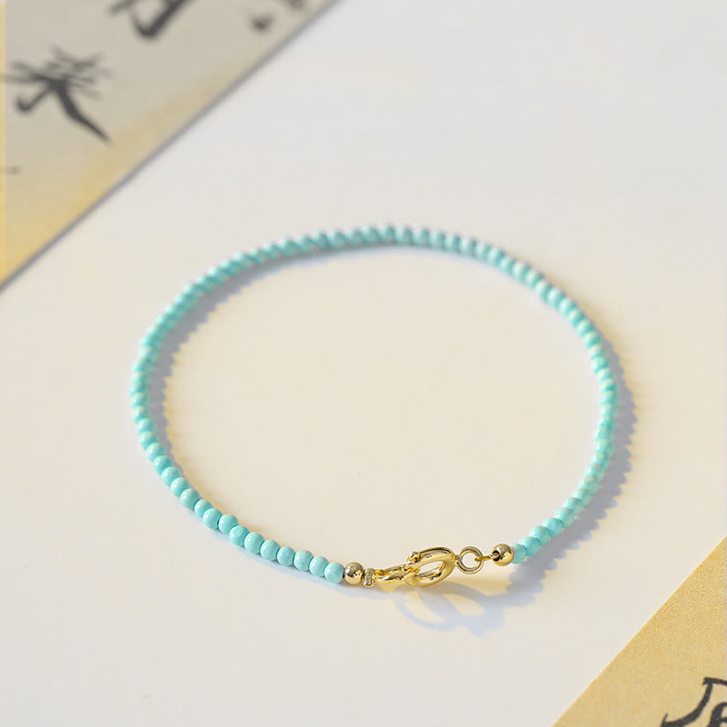 Pulsera de la sabiduría de cobre bañada en oro de 14 k con cuentas ultrafinas de turquesa de 2 mm y Buddha Stones