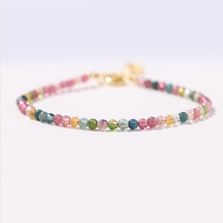 Pulsera de la sabiduría de cobre bañada en oro de 14 k con cuentas ultrafinas de turmalina multicolor de 2 mm y Buddha Stones