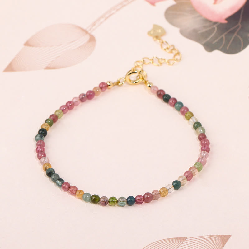 Pulsera de la sabiduría de cobre bañada en oro de 14 k con cuentas ultrafinas de turmalina multicolor de 2 mm y Buddha Stones