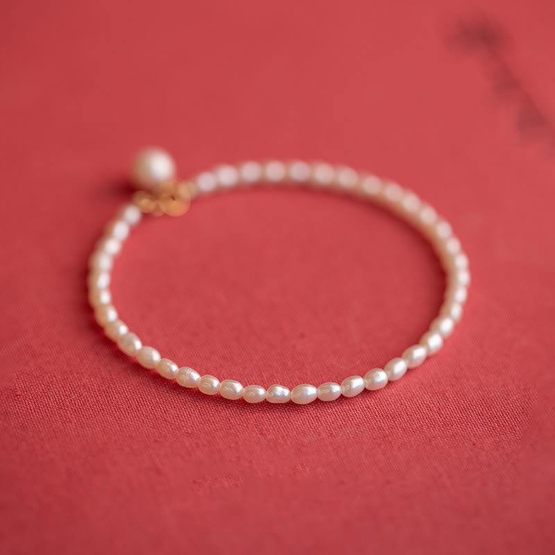 Pulsera de la sabiduría de cobre bañada en oro de 14 k con perlas naturales ultrafinas de 2 mm y Buddha Stones
