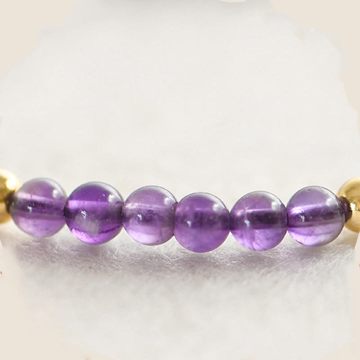 Pulsera trenzada de cuentas de cobre bañadas en oro de 14 k con amatista natural hecha a mano de 4 mm y Buddha Stones que alivia el estrés