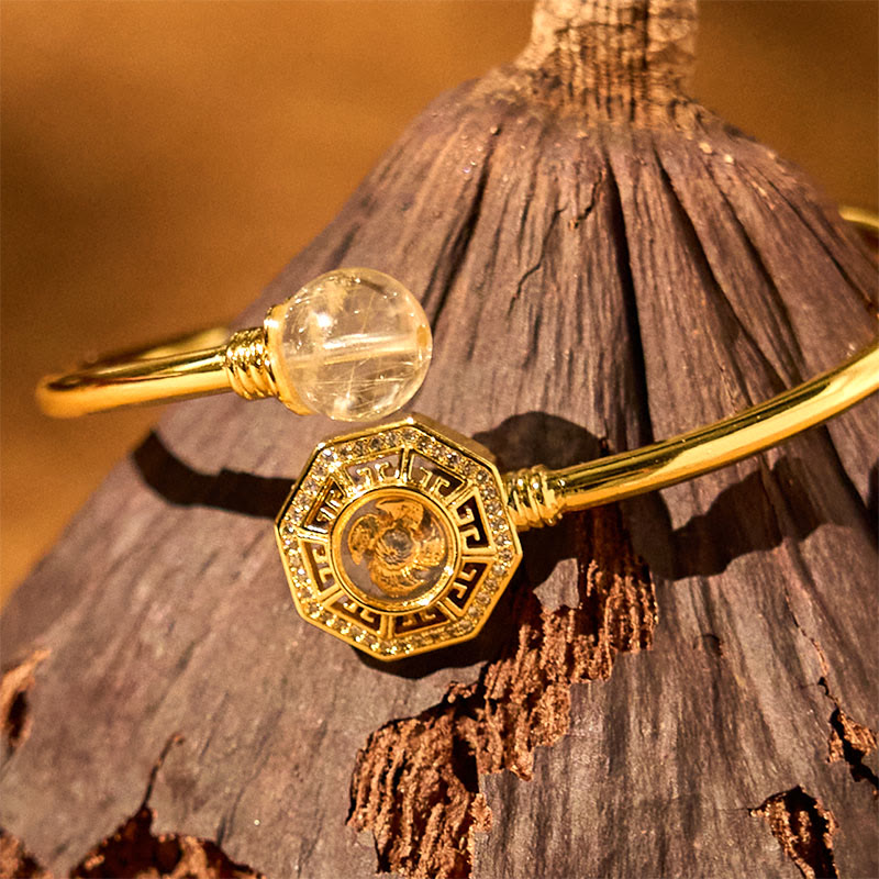 Pulsera brazalete de coraje de Feng Sheng Shui Qi con molino de viento giratorio de cobre y latón con Buddha Stones y cuarzo rutilado