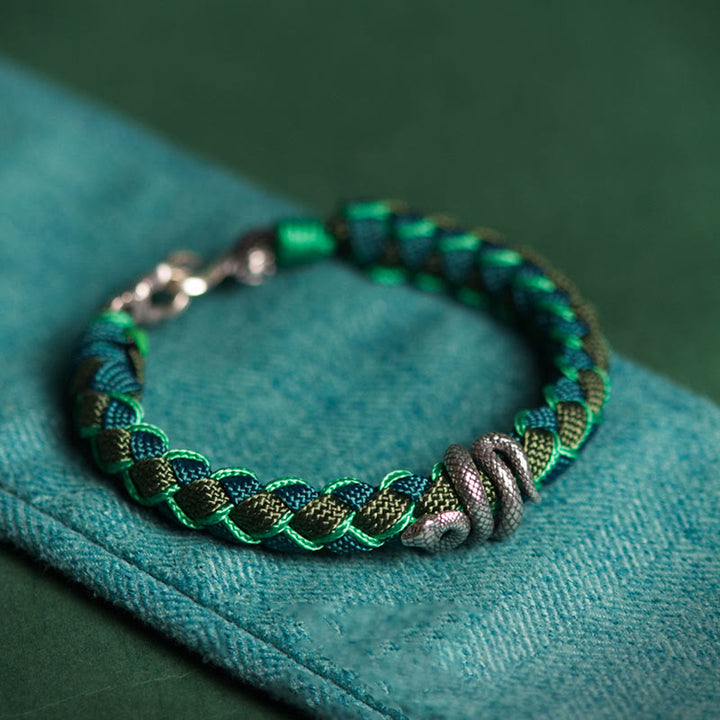 Pulsera trenzada protectora de hilo de plata de ley 999 con Buddha Stones y año de la serpiente - Cuerda verde y negra - 21 centímetros - image 0
