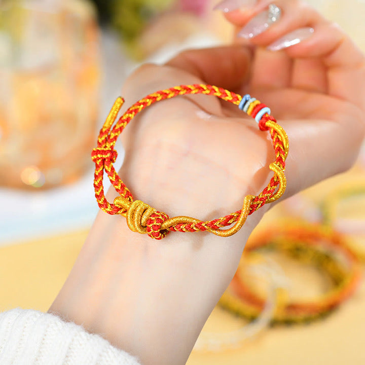 Pulsera de la suerte del año de la serpiente con serpiente y dragón de hilo colorido de Buddha Stones
