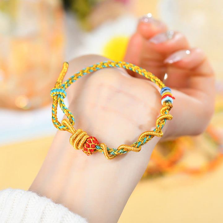 Pulsera de la suerte del año de la serpiente con serpiente y dragón de hilo colorido de Buddha Stones