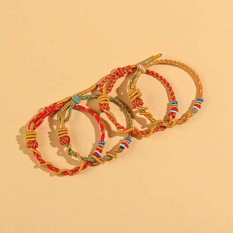 Pulsera de la suerte del año de la serpiente con serpiente y dragón de hilo colorido de Buddha Stones