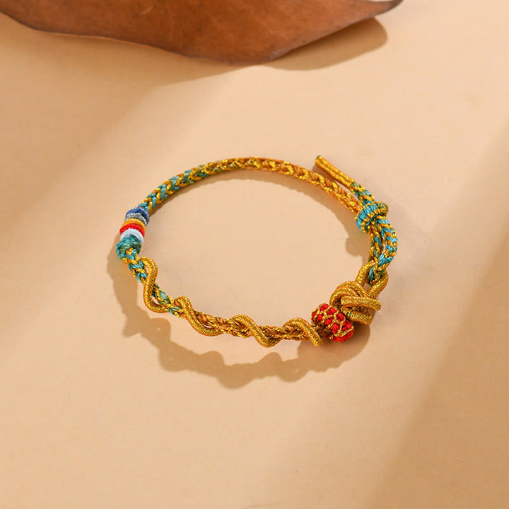 Pulsera de la suerte del año de la serpiente con serpiente y dragón de hilo colorido de Buddha Stones