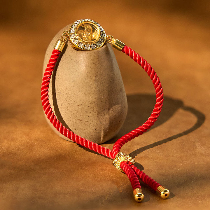 Pulsera trenzada con hilo rojo y molino de viento giratorio de Qi, Feng Sheng Shui, latón y cobre con Buddha Stones