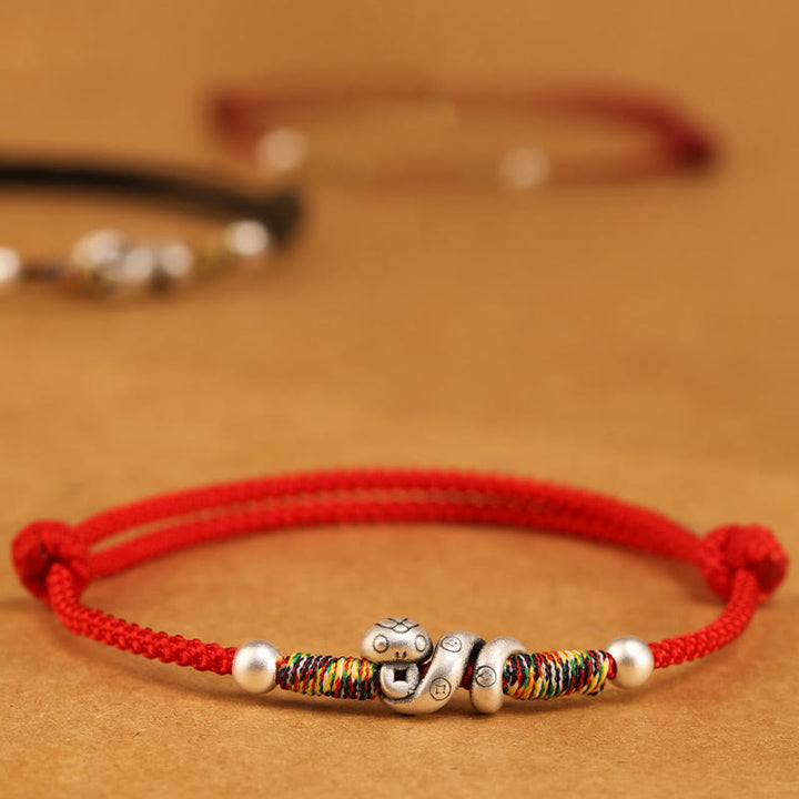 Tobillera con hilo rojo y Buddha Stones en plata de ley 999 con el año de la serpiente - image 2