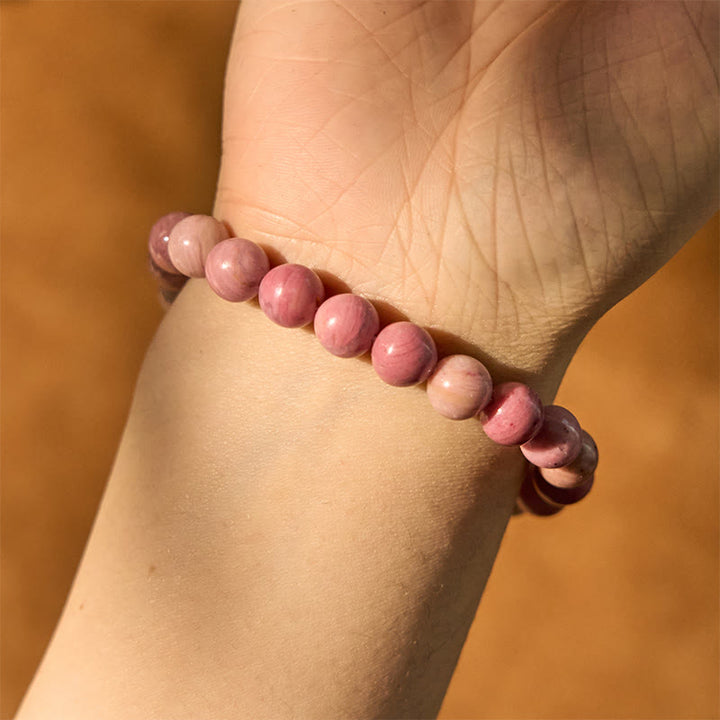 Pulsera de relaciones curativas con rodonita y Buddha Stones