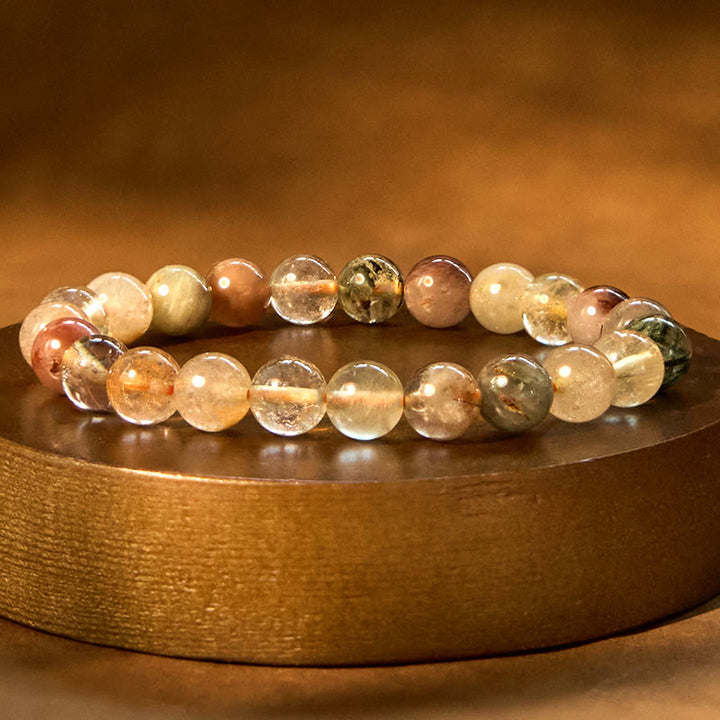 Pulsera de crecimiento espiritual de cuarzo rutilado multicolor natural con Buddha Stones