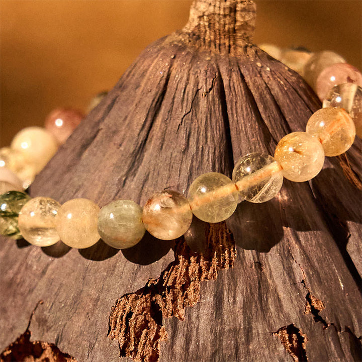 Pulsera de crecimiento espiritual de cuarzo rutilado multicolor natural con Buddha Stones
