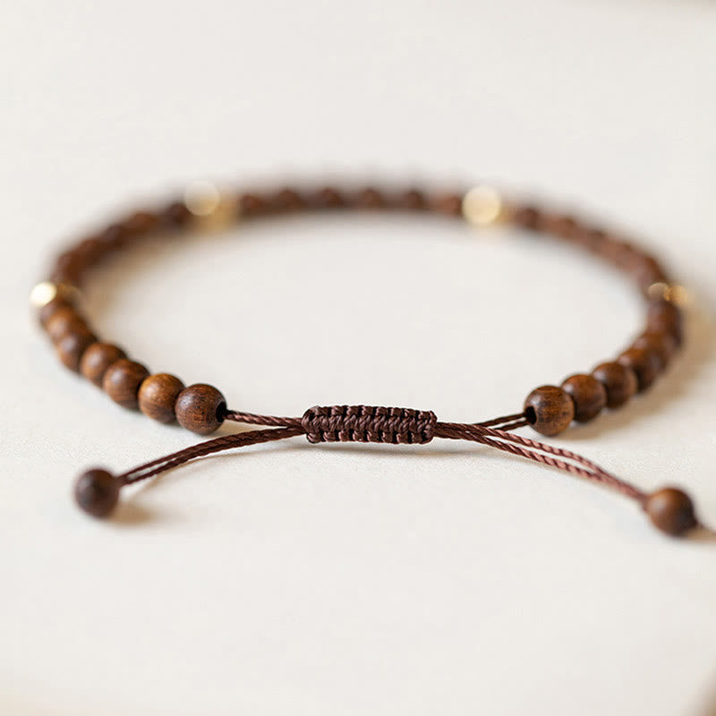Pulsera protectora con cuentas de cobre bañadas en oro de 14 quilates y sándalo ultrafinas de 4 mm y Buddha Stones