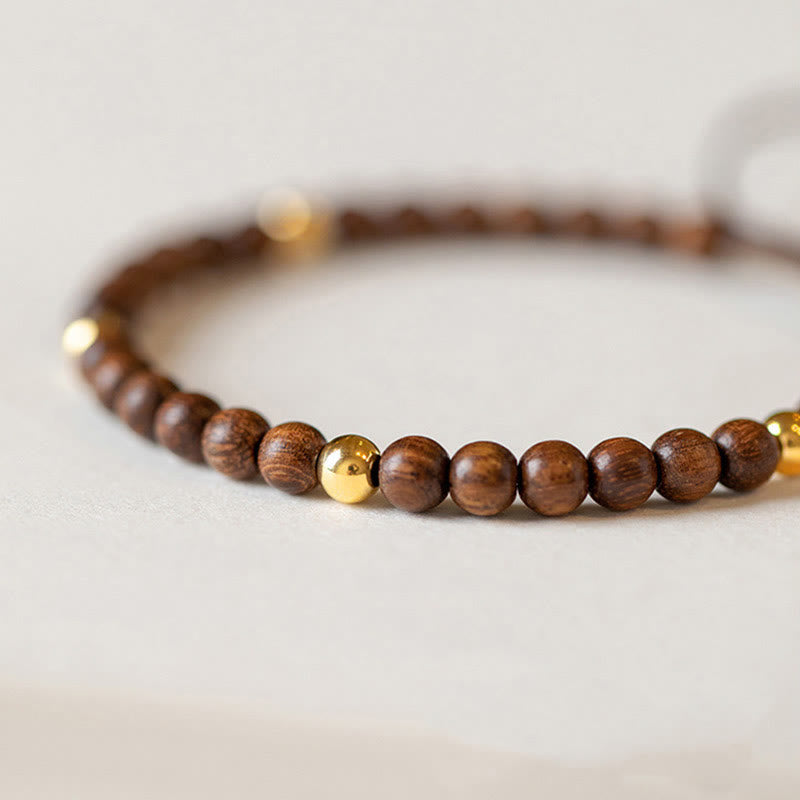 Pulsera protectora con cuentas de cobre bañadas en oro de 14 quilates y sándalo ultrafinas de 4 mm y Buddha Stones