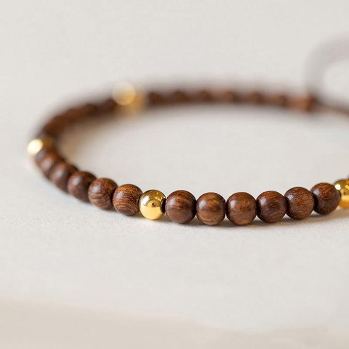 Pulsera protectora con cuentas de cobre bañadas en oro de 14 quilates y sándalo ultrafinas de 4 mm y Buddha Stones