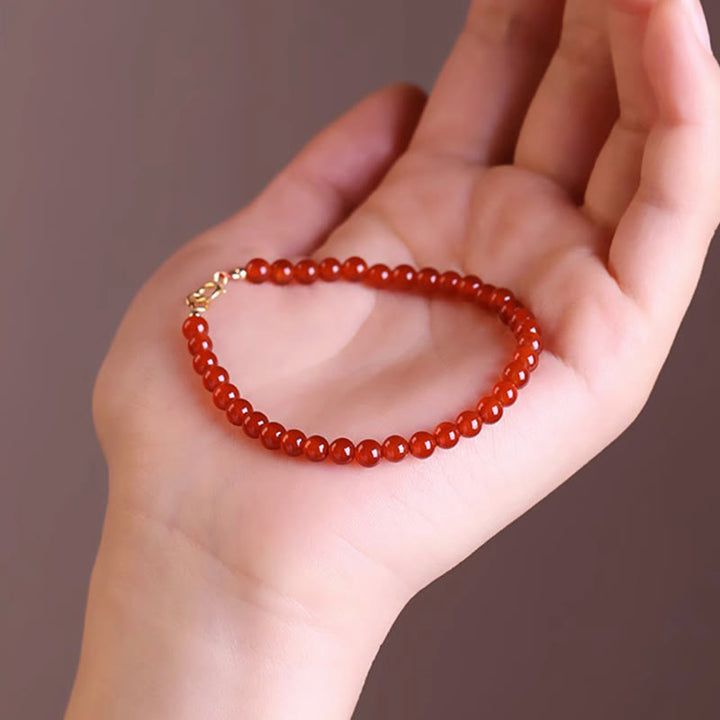 Pulsera de cuentas ultrafinas de ágata roja pequeña con Buddha Stones para calmar la mente
