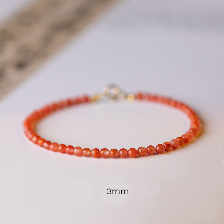 Pulsera de confianza con cuentas ultrafinas de ágata roja, cereza y caqui naturales de Buddha Stones