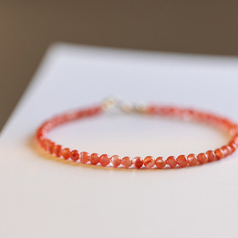 Pulsera de confianza con cuentas ultrafinas de ágata roja, cereza y caqui naturales de Buddha Stones