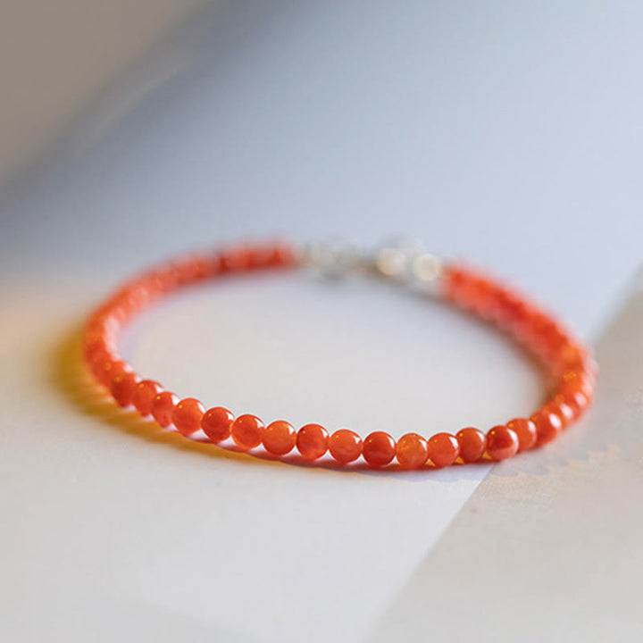 Pulsera de confianza con cuentas ultrafinas de ágata roja, cereza y caqui naturales de Buddha Stones