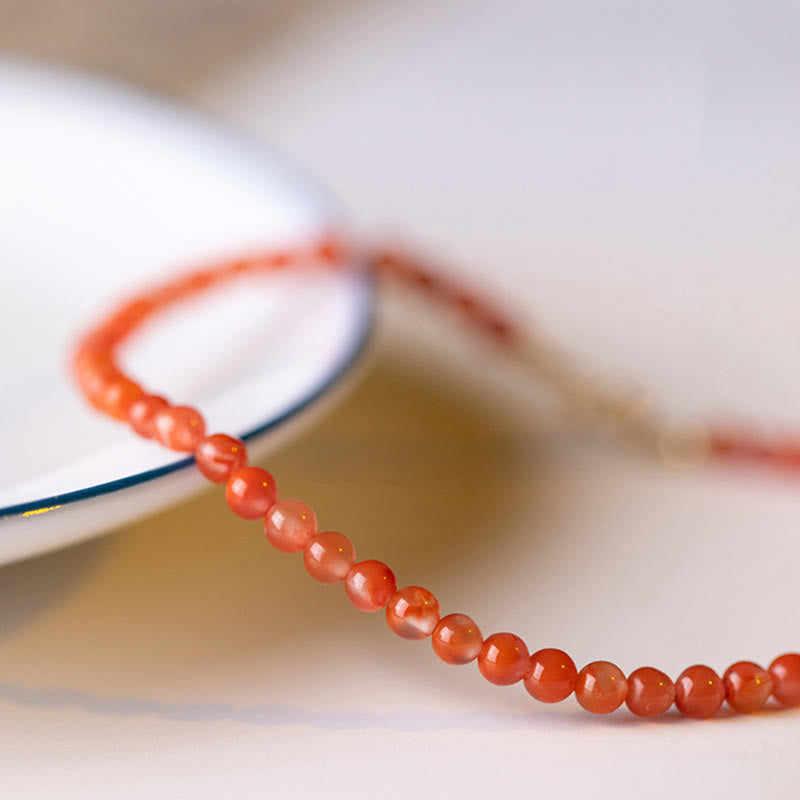 Pulsera de confianza con cuentas ultrafinas de ágata roja, cereza y caqui naturales de Buddha Stones