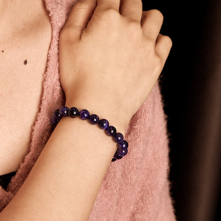 Pulsera creativa con ojo de tigre morado y Buddha Stones