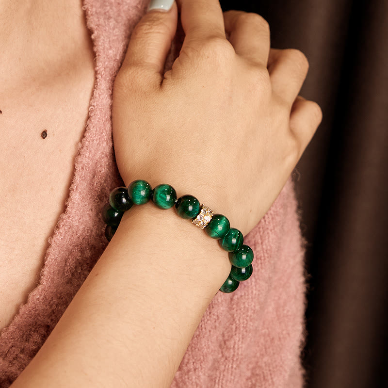 Pulsera positiva con ojo de tigre verde y Buddha Stones