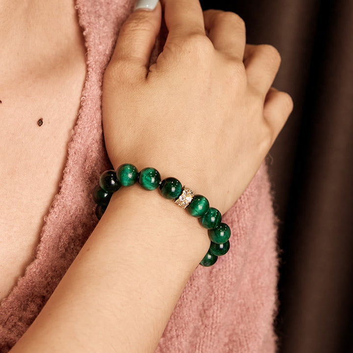 Pulsera positiva con ojo de tigre verde y Buddha Stones