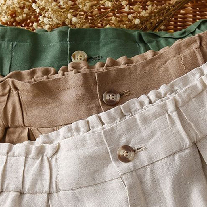 Pantalones cortos de lino y algodón con botones y cremallera plisados ​​de color liso con Buddha Stones para mujer con bolsillos - image 23