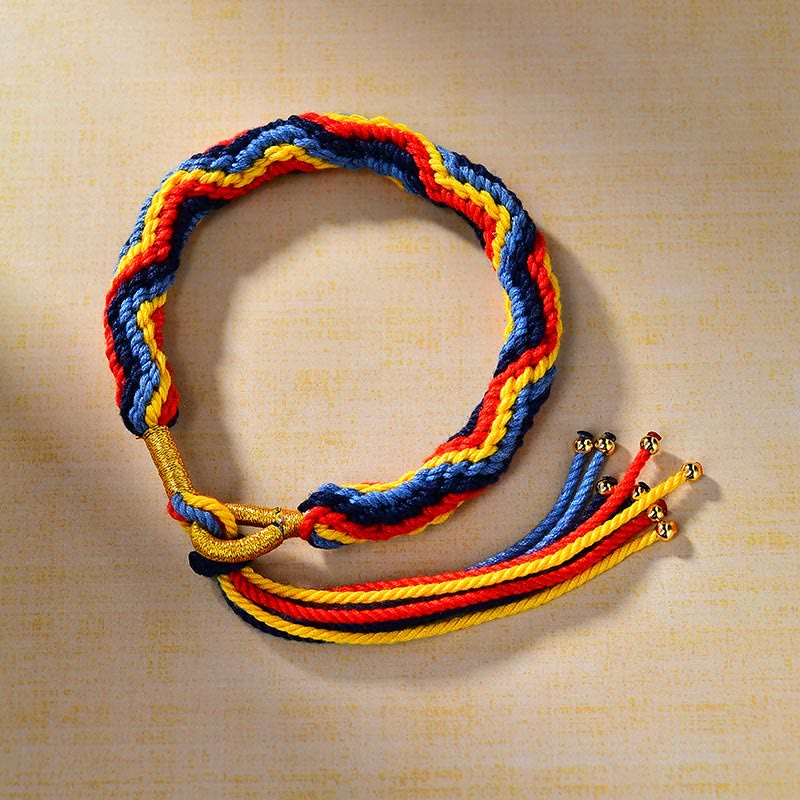 Pulsera de la suerte de cuerda de colores tejida a mano con Buddha Stones tibetanas