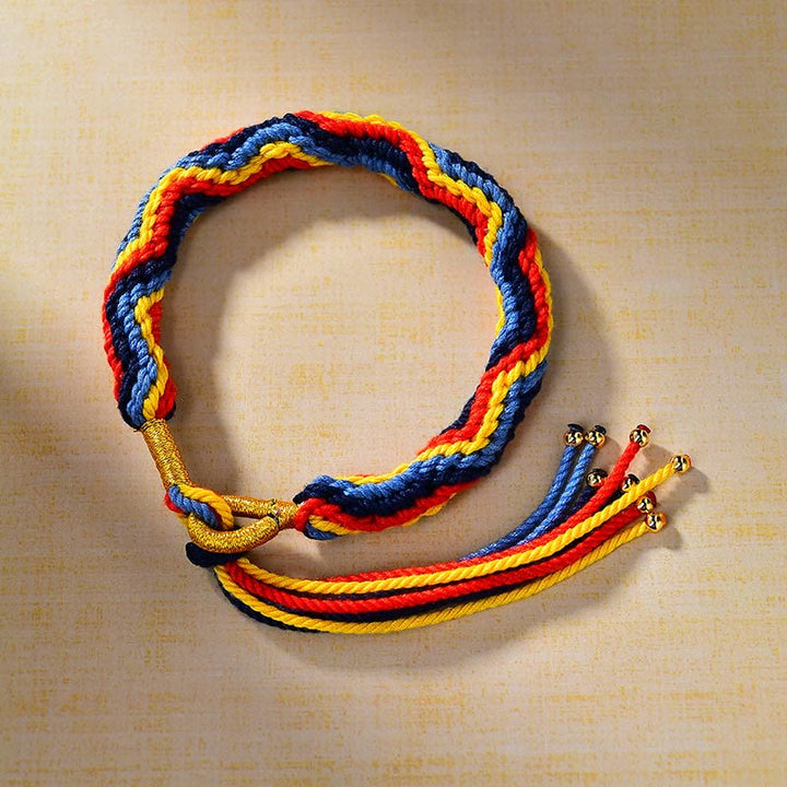 Pulsera de la suerte de cuerda de colores tejida a mano con Buddha Stones tibetanas