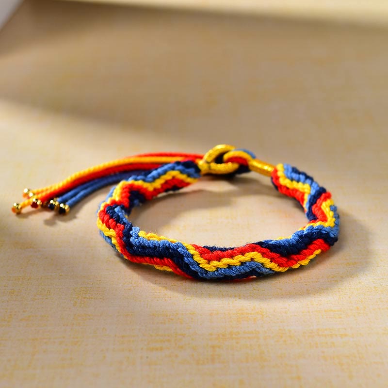 Pulsera de la suerte de cuerda de colores tejida a mano con Buddha Stones tibetanas