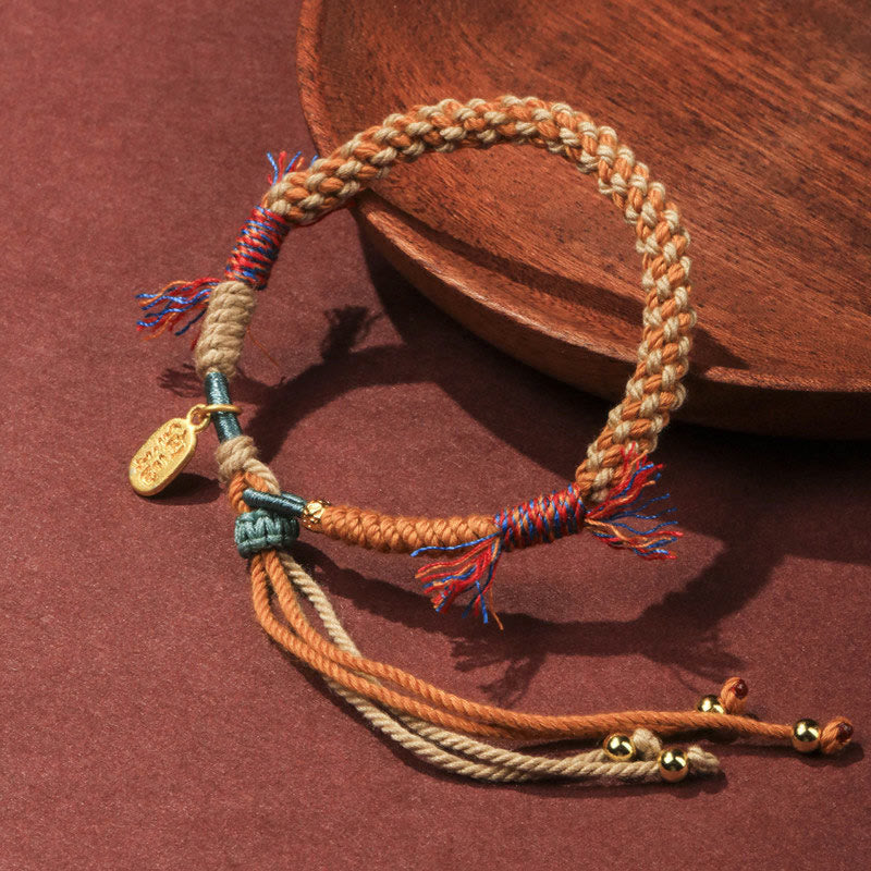 Pulsera de la suerte Nafu con borlas ajustables de cuerda de colores tejida a mano tibetana con Buddha Stones