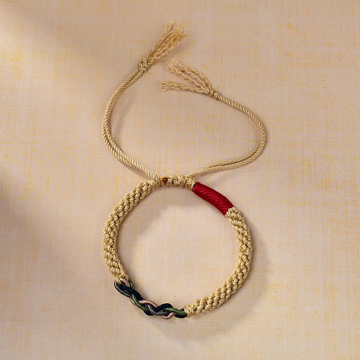 Pulsera de la suerte con cuerda de algodón frotada a mano tibetana con Buddha Stones