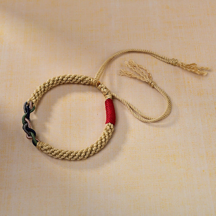 Pulsera de la suerte con cuerda de algodón frotada a mano tibetana con Buddha Stones