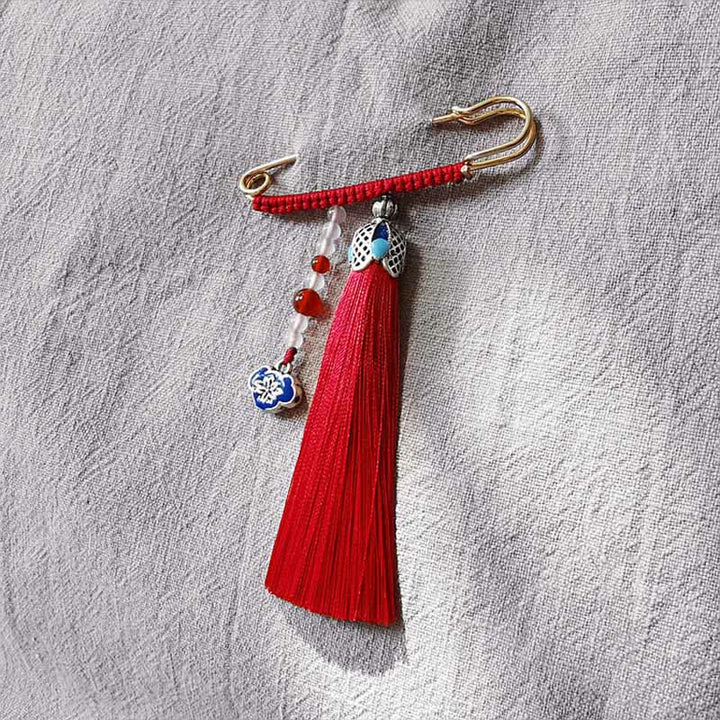 Broche positivo con Buddha Stones