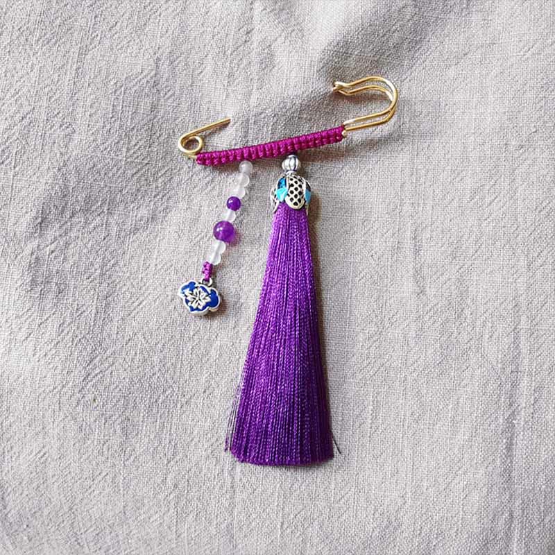 Broche positivo con Buddha Stones
