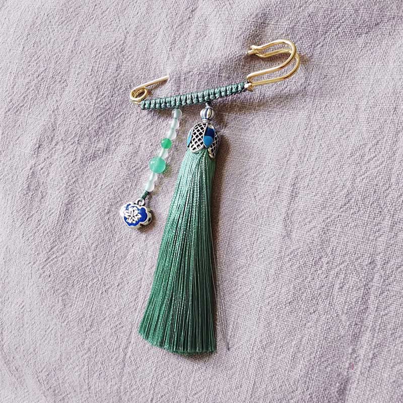 Broche positivo con Buddha Stones