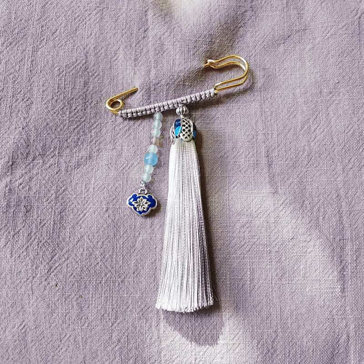 Broche positivo con Buddha Stones