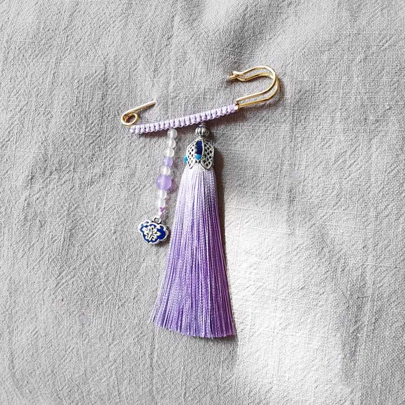 Broche positivo con Buddha Stones