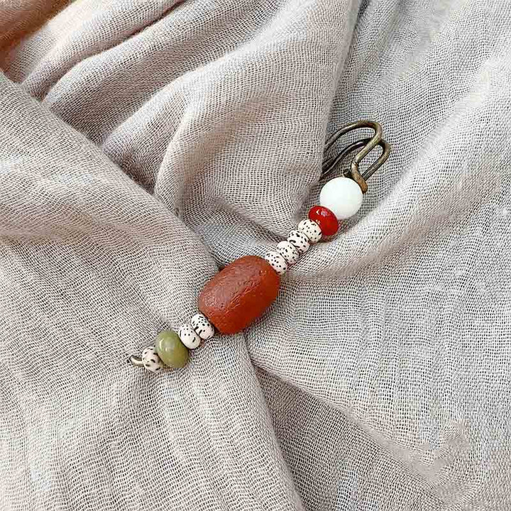 Broche de armonía tranquila con semillas de ágata y Buddha Stones Bodhi